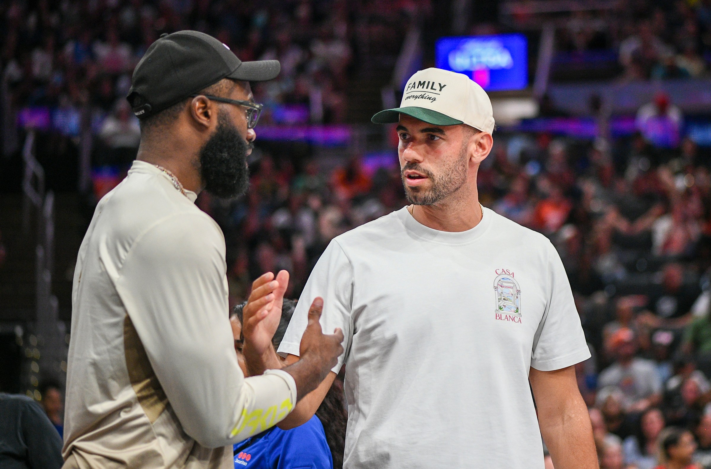 BOSTON, MA - JULY 15: Boston Celtics guard Jaylen Brown (left) and Boston Celtics forward Georges Niang (right) interact while attending a WNBA game between the Indiana Fever and the Connecticut Sun on July 15, 2025, at TD Garden in Boston, MA. (Photo by Erica Denhoff/Icon Sportswire via Getty Images)