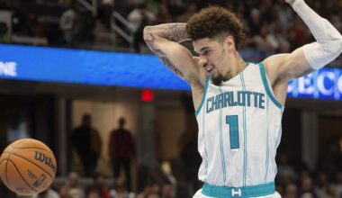 Charlotte Hornets' LaMelo Ball (1) watches the ball during the second half of an NBA basketball game against the Cleveland Cavaliers in Cleveland, Sunday, Nov 17, 2024. (AP Photo/Phil Long)