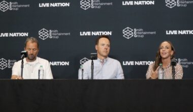 Michael Rapino, CEO of and President of Live Nation (left), Ryan Smith (center), chairman of SEG, a...