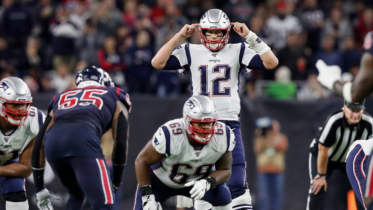 Shaq Mason and Tom Brady