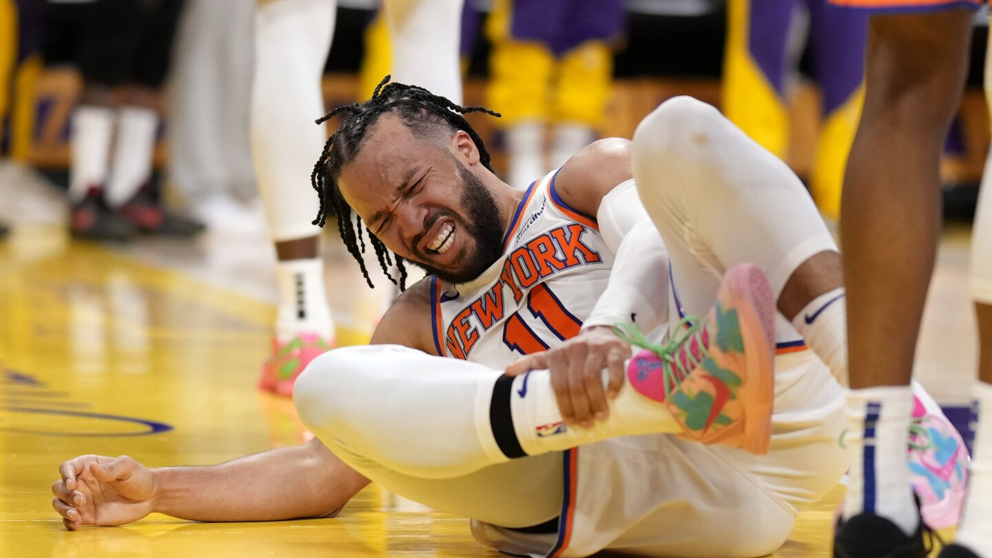 Jalen Brunson says his injured ankle is improving and he still hopes to play in the regular season