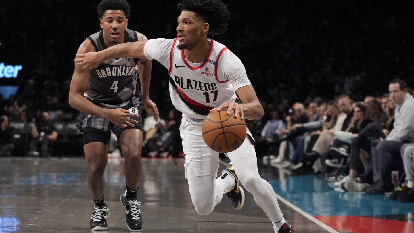 Sharpe scores 25 and Trail Blazers win 4th straight, 121-102 over Nets