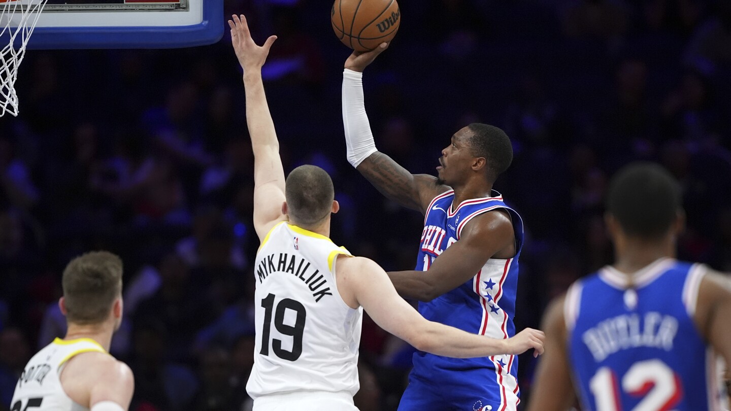 Walker scores 25 as the 76ers open 22-point 4th-quarter lead, hold on to beat the Jazz 126-122