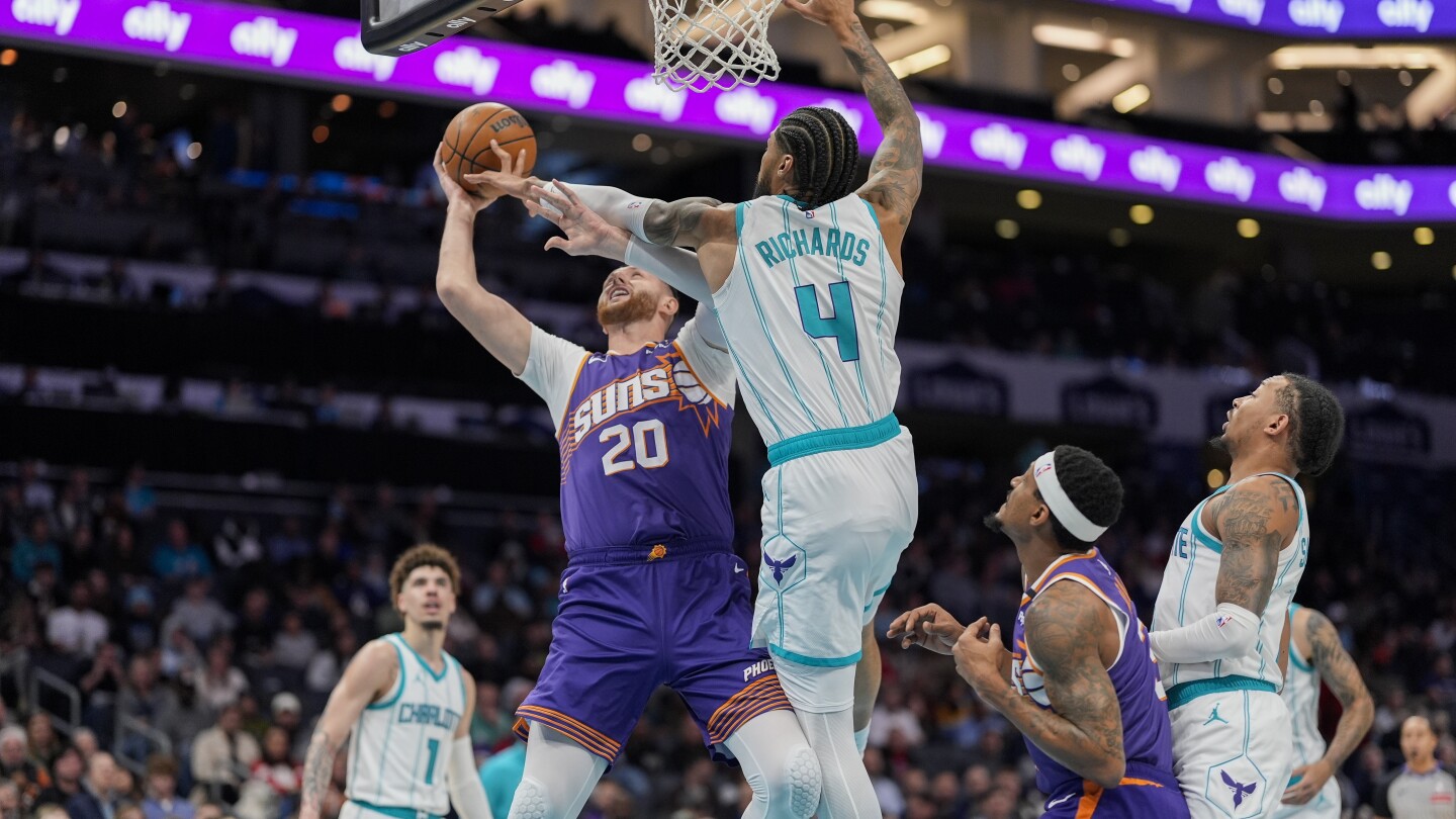 Hornets get Jusuf Nurkic and 1st-round pick from Suns for Cody Martin and Vasa Micic, AP source says
