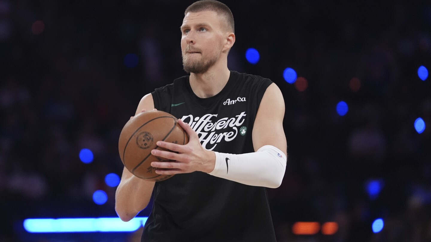 Porzingis going to Hawks in a 3-team trade agreement, AP source says