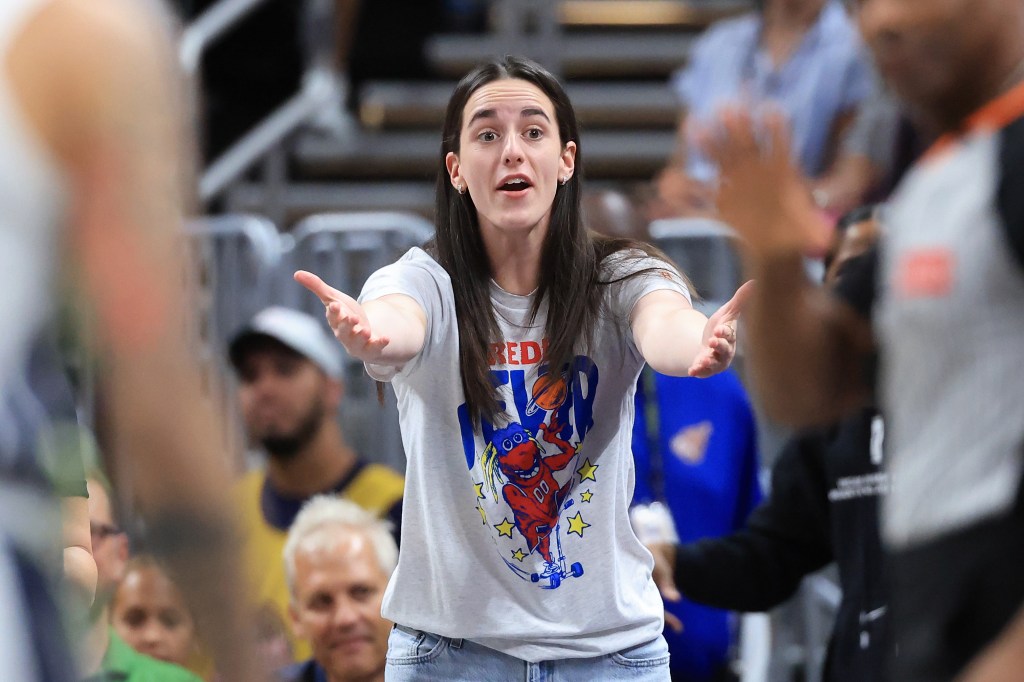 Caitlin Clark #22 of the Indiana Fever reacts during a game.