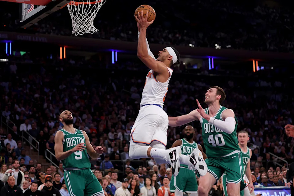 May 16, 2025; New York, New York, USA; New York Knicks guard Josh Hart (3) drives to the basket against Boston Celtics guards Derrick White (9) and Jaylen Brown (7) and center Luke Kornet (40) during the second quarter of game six in the second round of the 2025 NBA Playoffs at Madison Square Garden. Mandatory Credit: Brad Penner-Imagn Images