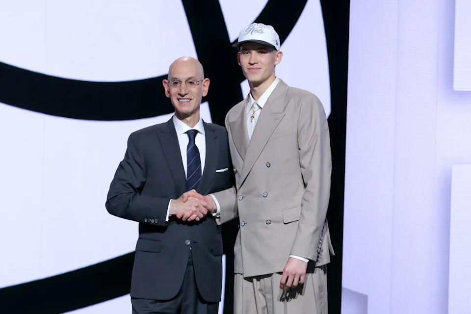 NBA commissioner Adam Silver and Brooklyn Nets guard Egor Demin.Brad Penner-Imagn Images
