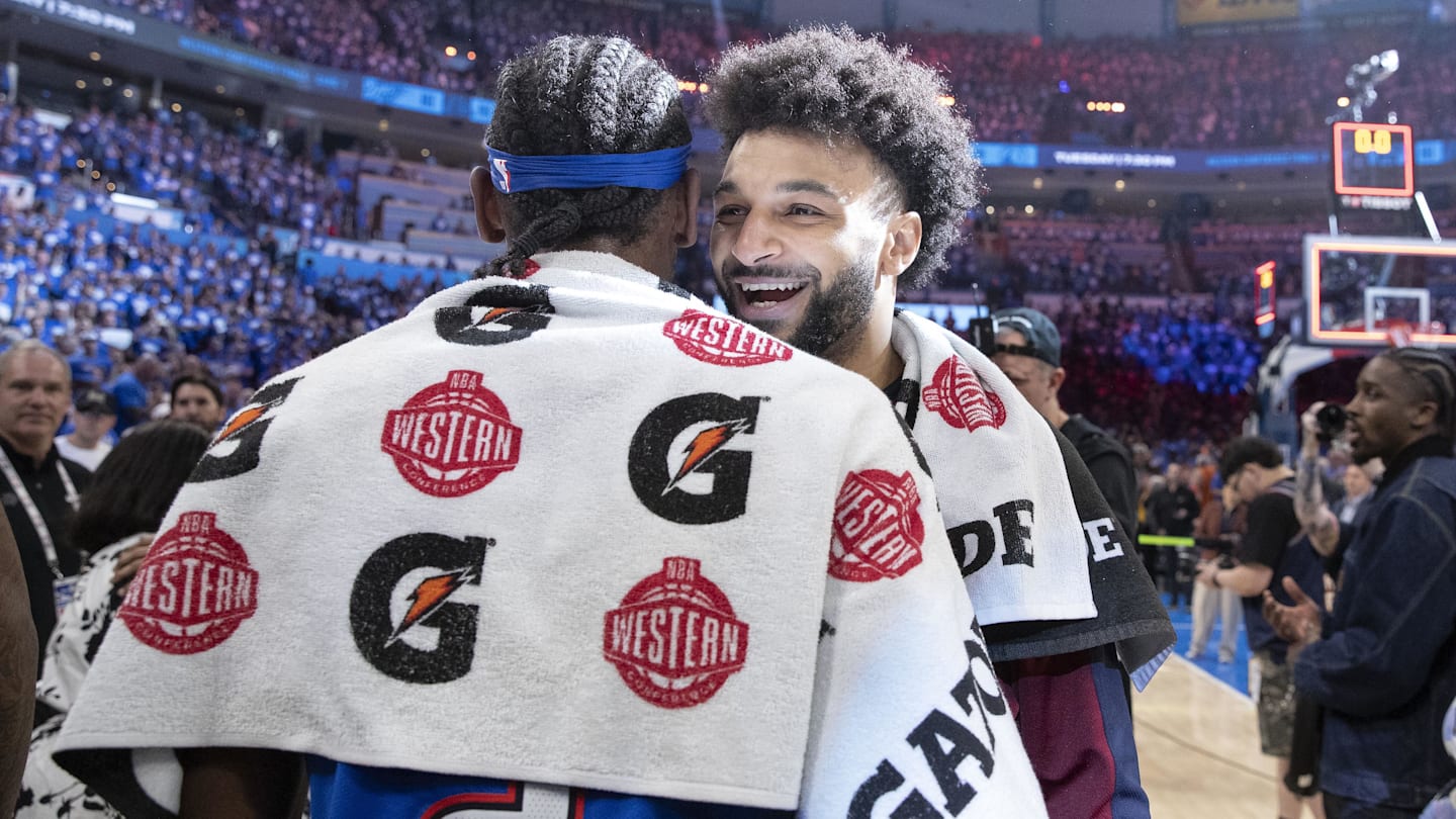 May 18, 2025; Oklahoma City, Oklahoma, USA; Denver Nuggets guard Jamal Murray (27) and Oklahoma City Thunder guard Shai Gilgeous-Alexander (2) hug after their game seven of the second round for the 2025 NBA Playoffs at Paycom Center. Mandatory Credit: Alonzo Adams-Imagn Images