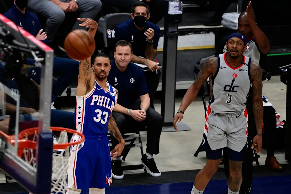 May 31, 2021; Washington, District of Columbia, USA; Philadelphia 76ers guard George Hill (33) shoots as Washington Wizards guard Bradley Beal (3) looks on in the second half during game four in the first round of the 2021 NBA Playoffs. at Capital One Arena. Mandatory Credit: Tommy Gilligan-USA TODAY Sports