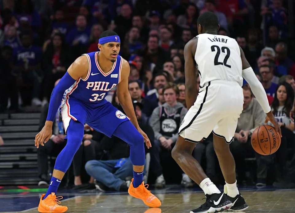 Mar 28, 2019; Philadelphia, PA, USA; Philadelphia 76ers forward Tobias Harris (33) defends against Brooklyn Nets guard Caris LeVert (22) during the first quarter at Wells Fargo Center. Mandatory Credit: Eric Hartline-USA TODAY Sports