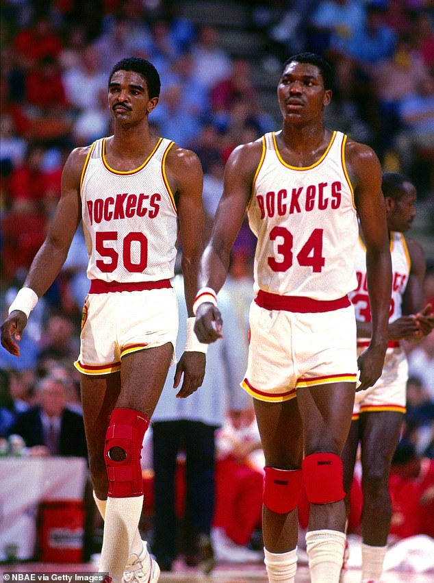 Houston's Twin Towers, Ralph Sampson (left) and Hakeem Olajuwon, are seen in 1985