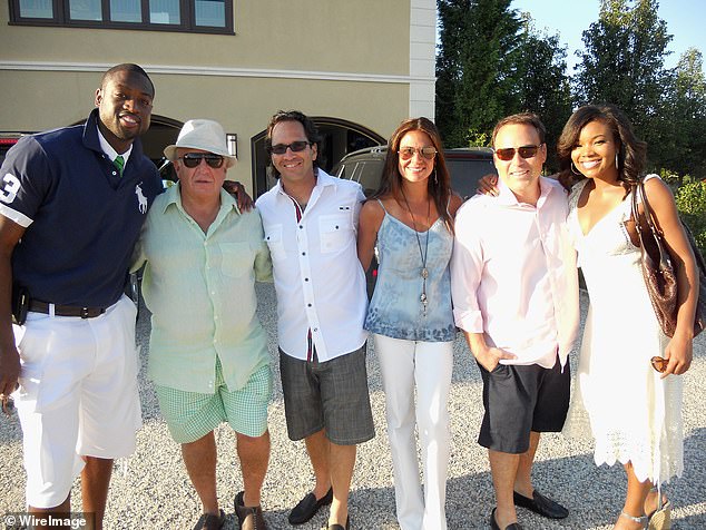 NBA great Dwyane Wade, Artie Rabin, Jason Rabin, Nicole Rabin, Jared Margolis and actress Gabrielle Union pose circa November 2010 in The Hamptons