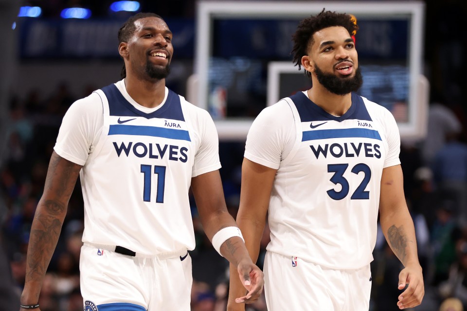 Naz Reid #11 and Karl-Anthony Towns #32 of the Minnesota Timberwolves.