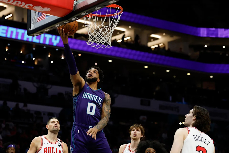 Apr 6, 2025; Charlotte, North Carolina, USA; Charlotte Hornets forward Miles Bridges (0) drives to the basket against the Chicago Bulls during the first quarter at Spectrum Center. Mandatory Credit: Nell Redmond-Imagn Images