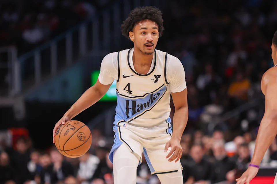 Nov 25, 2024; Atlanta, Georgia, USA; Atlanta Hawks guard Kobe Bufkin (4) dribbles against the Dallas Mavericks in the fourth quarter at State Farm Arena. Mandatory Credit: Brett Davis-Imagn Images