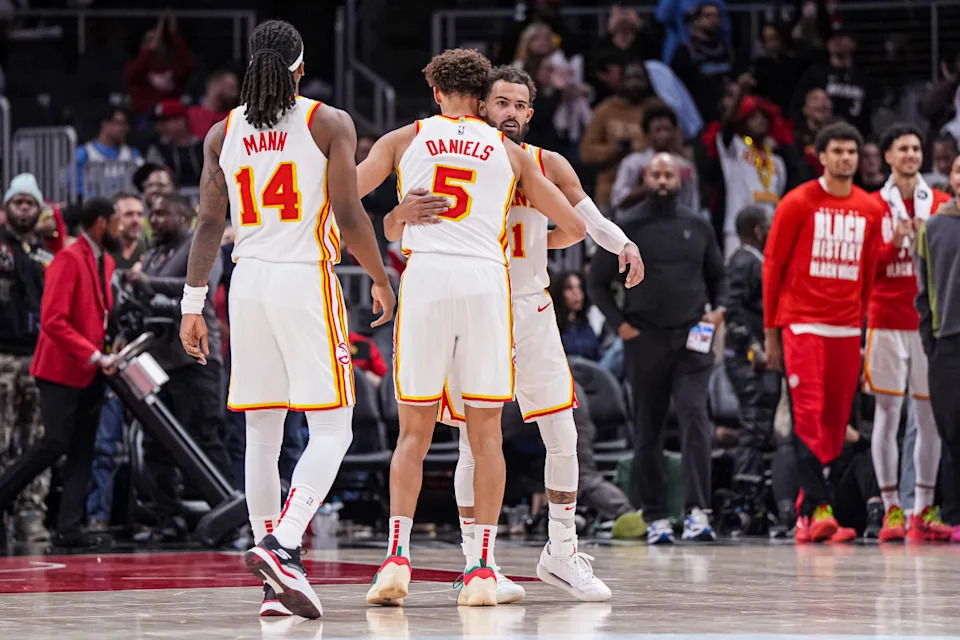 Atlanta Hawks guards Trae Young and Dyson Daniels and forward Terance Mann.Dale Zanine