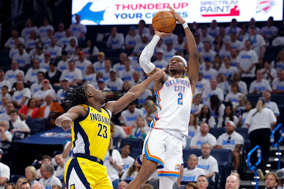 Jun 5, 2025; Oklahoma City, Oklahoma, USA; Oklahoma City Thunder guard Shai Gilgeous-Alexander (2) shoots the ball over Indiana Pacers forward Aaron Nesmith (23) during the third quarter during game one of the 2025 NBA Finals at Paycom Center. Mandatory Credit: Alonzo Adams-Imagn Images