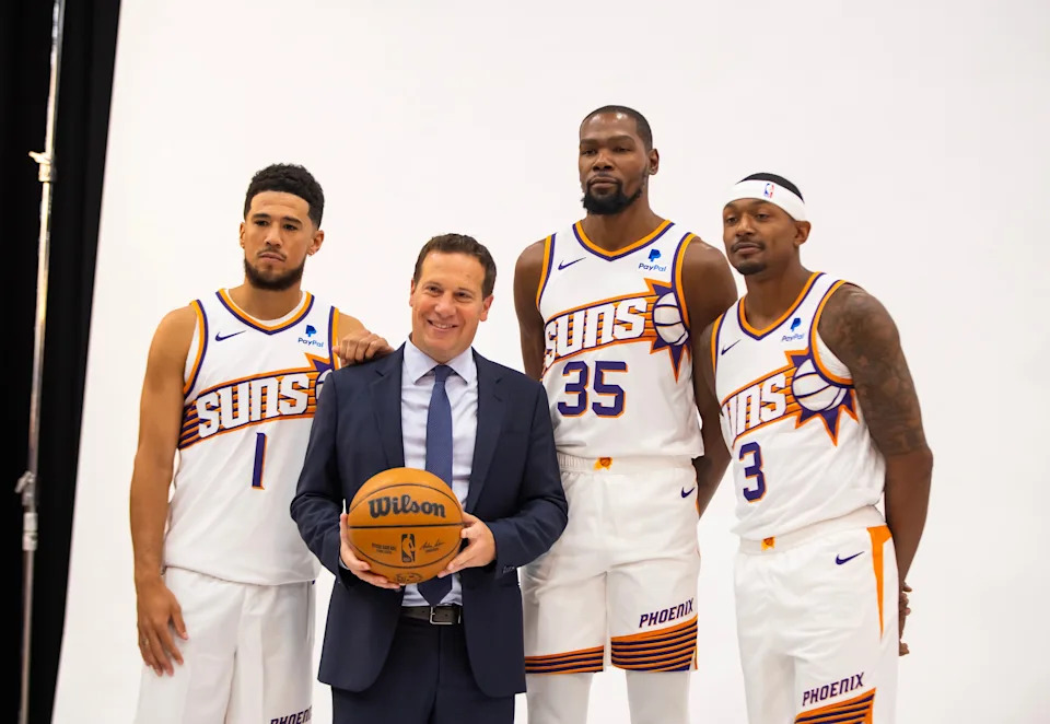 Oct 2, 2023; Phoenix, AZ, USA; Phoenix Suns guard Devin Booker (1), team owner Mat Ishbia, forward Kevin Durant (35) and guard Bradley Beal (3) pose for a portrait during media day at Footprint Center. Mandatory Credit: Mark J. Rebilas-USA TODAY Sports