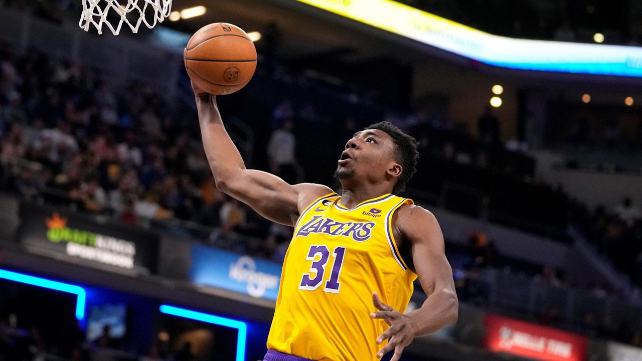 Los Angeles Lakers center Thomas Bryant (31) goes up for a dunk against the Indiana Pacers during the first half of an NBA basketball game in Indianapolis, Thursday, Feb. 2, 2023. (AP Photo/Michael Conroy)