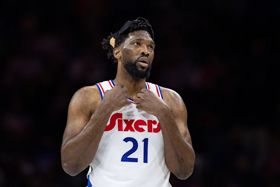 Dec 23, 2024; Philadelphia, Pennsylvania, USA; Philadelphia 76ers center Joel Embiid (21) looks on during the first quarter against the San Antonio Spurs at Wells Fargo Center. Mandatory Credit: Bill Streicher-Imagn Images
