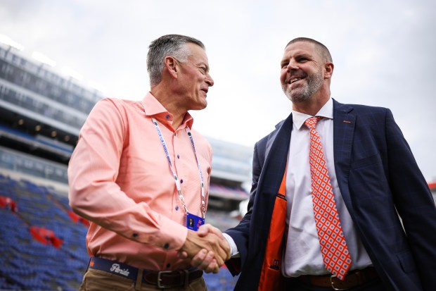 UF athletic director Scott Stricklin (left) and football coach Billy Napier are in their fourth season together at UF. (James Gilbert/Getty)
