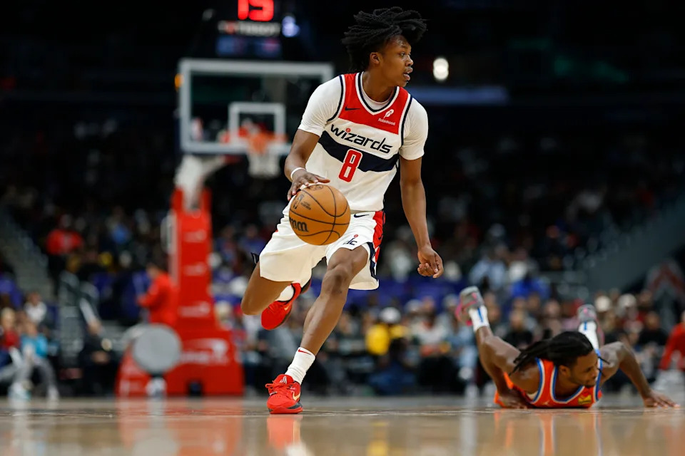 Jan 12, 2025; Washington, District of Columbia, USA; Washington Wizards guard Bub Carrington (8) dribbles the ball past Oklahoma City Thunder guard Cason Wallace (22) in the second quarter at Capital One Arena. Mandatory Credit: Geoff Burke-Imagn Images
