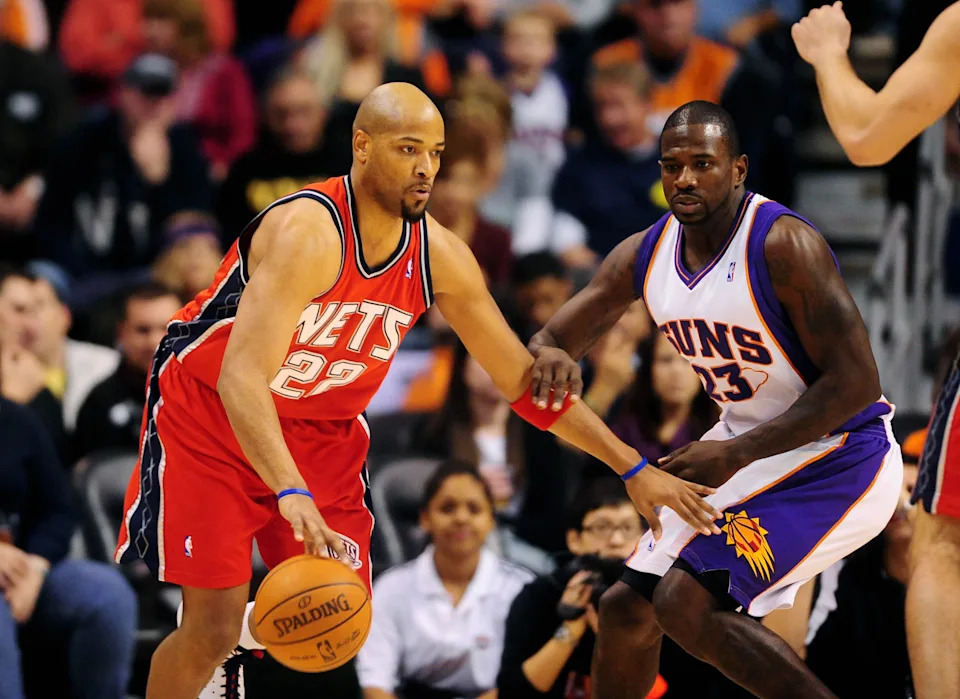 Jan. 20, 2010; Phoenix, AZ, USA; New Jersey Nets forward (22) Jarvis Hayes controls the ball against Phoenix Suns forward (23) Jason Richardson at the US Airways Center. The Suns defeated the Nets 118-94. Mandatory Credit: Mark J. Rebilas-USA TODAY Sports