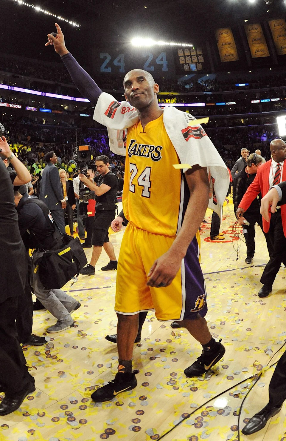 Los Angeles Lakers guard Kobe Bryant walks off the court for the final time after a game against the Utah Jazz on April 13, 2016.