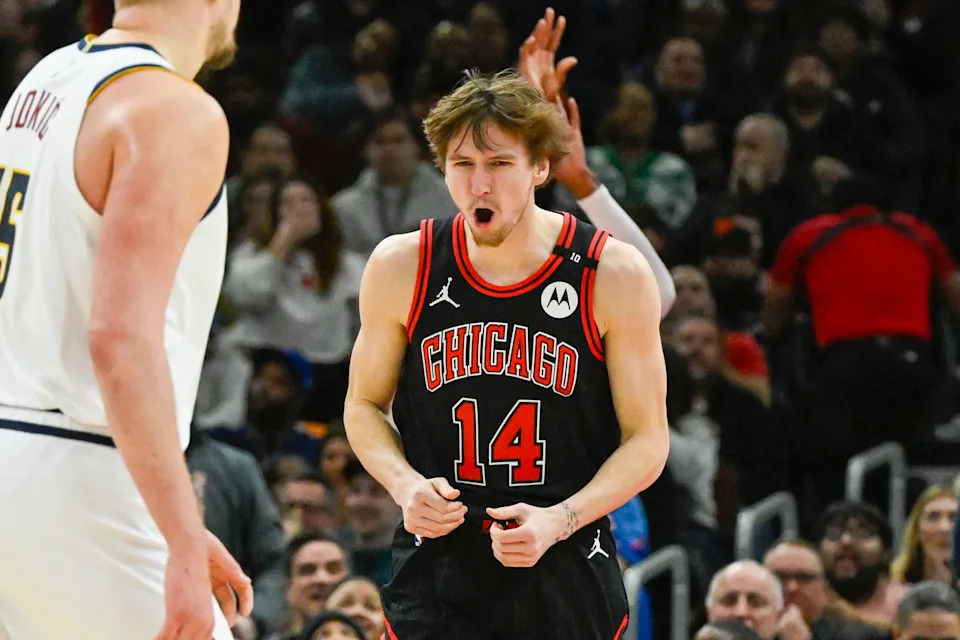 Jan 27, 2025; Chicago, Illinois, USA; Chicago Bulls forward Matas Buzelis (14) reacts after a dunk against the Denver Nuggets during the second half at the United Center. Mandatory Credit: Matt Marton-Imagn Images