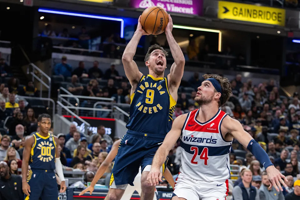 Indiana Pacers guard T.J. McConnell (9) shoots the ball while Washington Wizards forward Corey Kispert (24)© Trevor Ruszkowski-Imagn Images