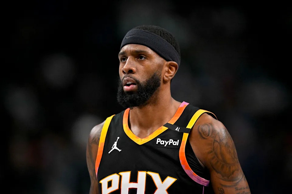 Phoenix Suns forward Royce O'Neale (00)Jerome Miron-Imagn Images