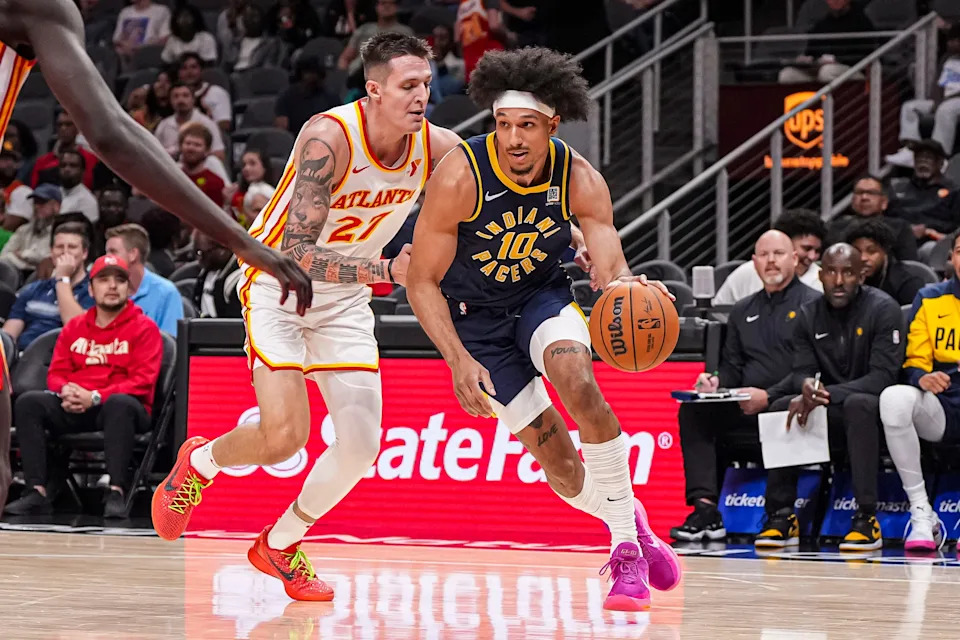 Oct 8, 2024; Atlanta, Georgia, USA; Indiana Pacers guard Kendall Brown (10) dribbles past Atlanta Hawks guard Vit Krejci (27) during the second half at State Farm Arena. Mandatory Credit: Dale Zanine-Imagn Images