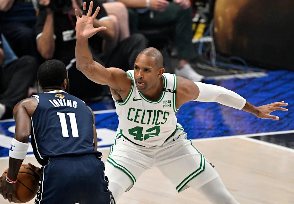 Jun 12, 2024; Dallas, Texas, USA; Boston Celtics center Al Horford (42) defends Dallas Mavericks guard Kyrie Irving (11) during the first quarter in game three of the 2024 NBA Finals at American Airlines Center. Mandatory Credit: Jerome Miron-USA TODAY Sports