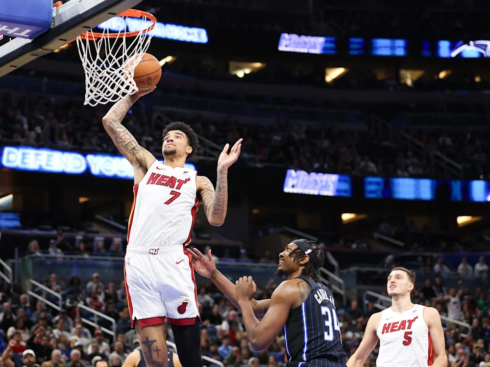 Dec 21, 2024; Orlando, Florida, USA; Miami Heat center Kel'el Ware (7) dunks the ball against the Orlando Magic in the first quarter at Kia Center. Mandatory Credit: Nathan Ray Seebeck-Imagn Images