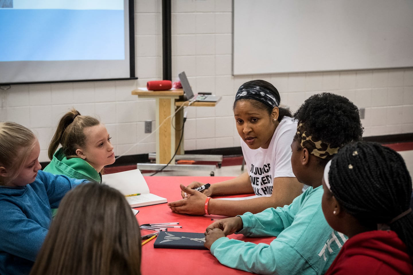 Maya Moore teaches a Black History Month workshop at Lewis and Clark Middle School, where she attended in her youth, in Jefferson City, Mo.