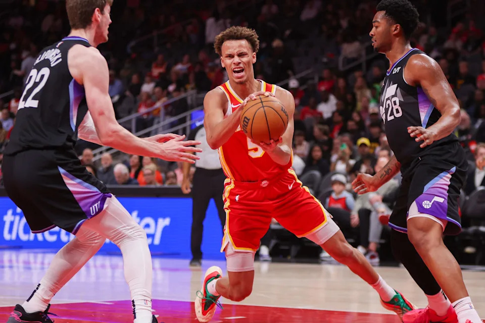 Apr 6, 2025; Atlanta, Georgia, USA; Atlanta Hawks guard Dyson Daniels (5) drives to the basket against the Utah Jazz in the first quarter at State Farm Arena. Mandatory Credit: Brett Davis-Imagn Images