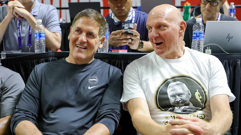 Mark Cuban and Steve Ballmer talk before a 2025 NBA Summer League game.