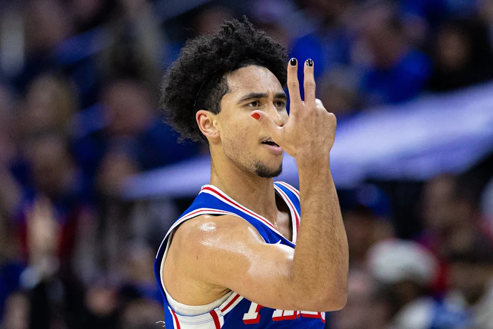 Dec 4, 2024; Philadelphia, Pennsylvania, USA; Philadelphia 76ers guard Jared McCain (20) reacts to his three pointer against the Orlando Magic during the second quarter at Wells Fargo Center. Mandatory Credit: Bill Streicher-Imagn Images