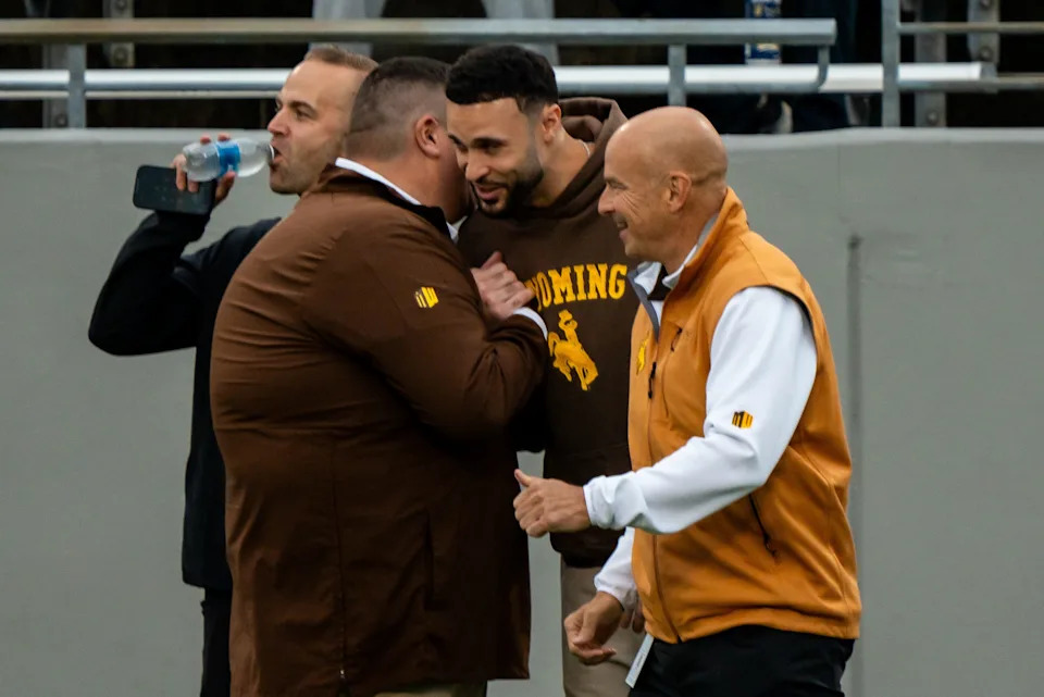 Larry Nance Jr., of the Cleveland Cavaliers, greets people on the Wyoming sideline before the season opening game against Akron, Aug. 28, 2025, at InfoCision Stadium in Akron, Ohio.
