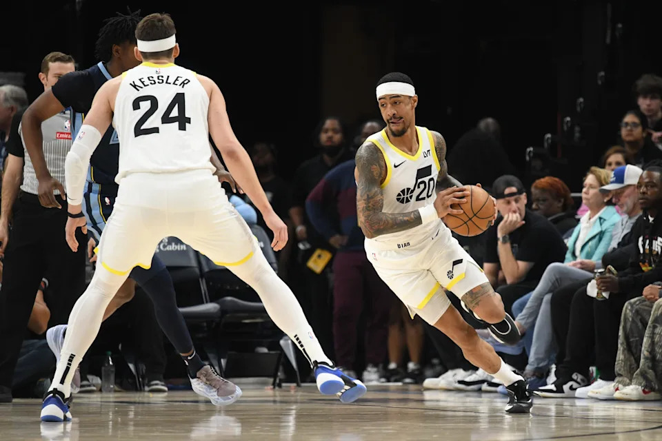 Mar 12, 2025; Memphis, Tennessee, USA; Utah Jazz power forward John Collins (20) drives around a screen set by teammate Utah Jazz center Walker Kessler (24) in the 2nd quarter of the Utah Jazz vs. Memphis Grizzlies game at FedExForum. Mandatory Credit: Matthew Smith-Imagn Images