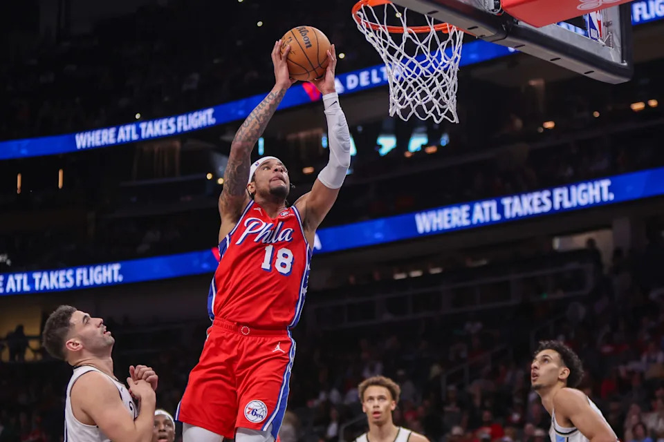 Mar 23, 2025; Atlanta, Georgia, USA; Philadelphia 76ers forward Chuma Okeke (18) dunks against the Atlanta Hawks in the first quarter at State Farm Arena. Mandatory Credit: Brett Davis-Imagn Images