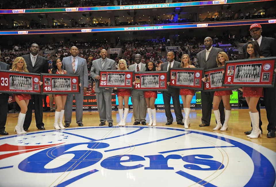 Apr 14, 2013; Philadelphia, PA, USA; Members of the Philadelphia 76ers 1982-83 NBA Championship team, from left: Reggie Johnson (33), Clemon Johnson (45), Earl Cureton (25), Franklin Edwards (14), Clint Richardson (4), Moses Malone (2) and Julius Erving (6) were honored for their 30th anniversary celebration during halftime of the game between Philadelphia 76ers and Cleveland Cavaliers at the Wells Fargo Center. Mandatory Credit: Eric Hartline-USA TODAY Sports