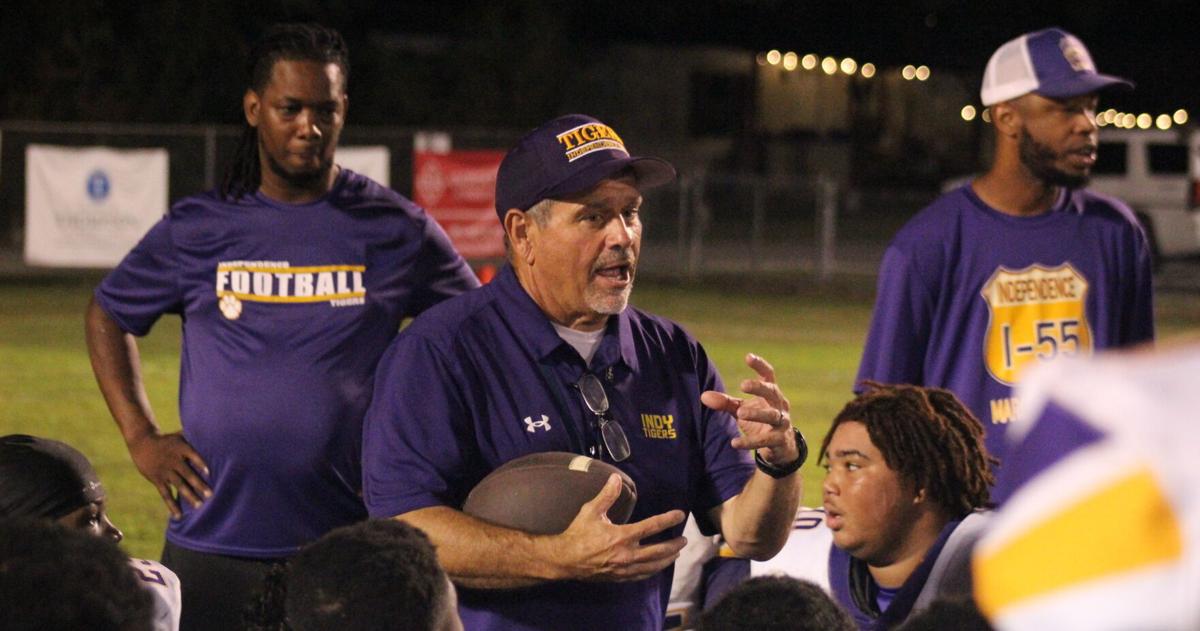 Tigers hold off Hornets for Messina's first win | Sports