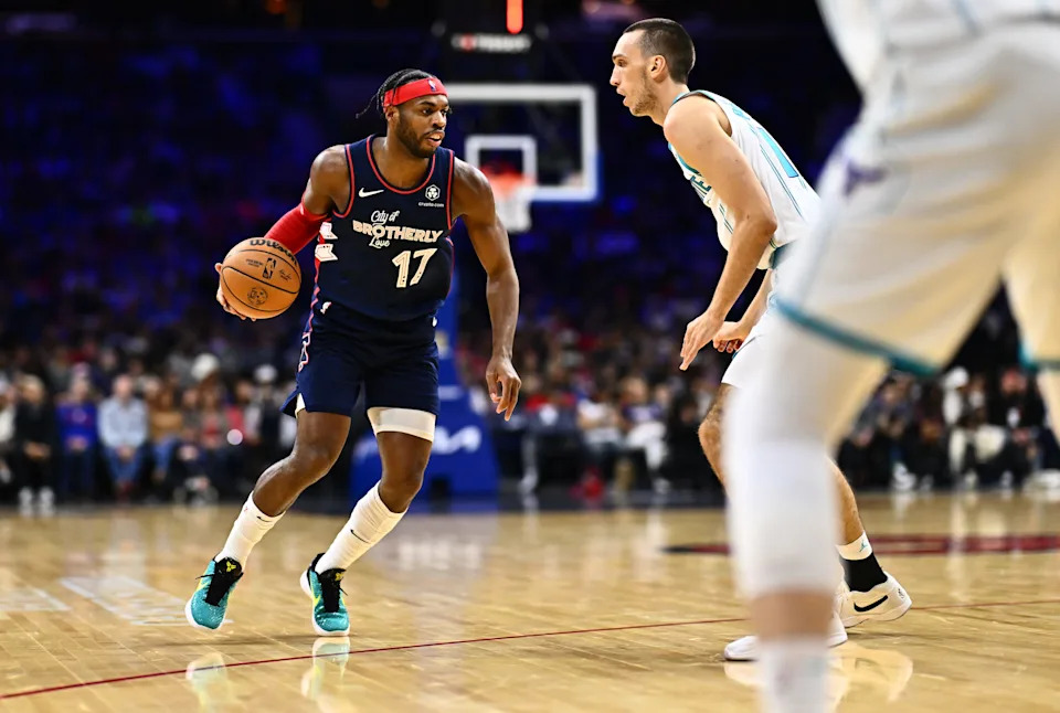 Mar 16, 2024; Philadelphia, Pennsylvania, USA; Philadelphia 76ers guard Buddy Hield (17) controls the ball against Charlotte Hornets forward Aleksej Pokusevski (17) in the first quarter at Wells Fargo Center. Mandatory Credit: Kyle Ross-USA TODAY Sports