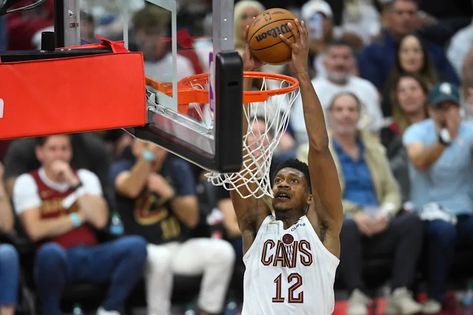 Apr 23, 2025; Cleveland, Ohio, USA; Cleveland Cavaliers forward De'Andre Hunter (12) dunks in the third quarter of game two of the first round of the 2025 NBA Playoffs against the Miami Heat at Rocket Arena. Mandatory Credit: David Richard-Imagn Images