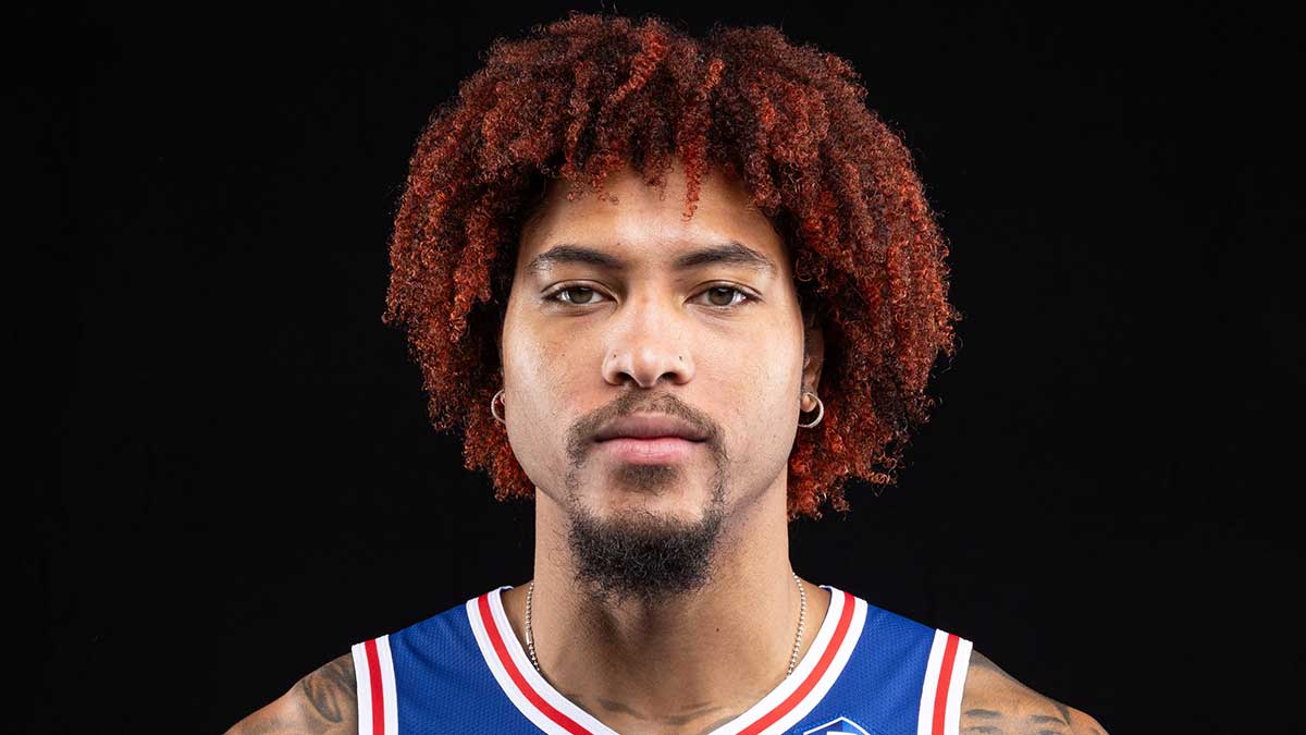 76ers guard Kelly Oubre Jr. poses for a photo during media day