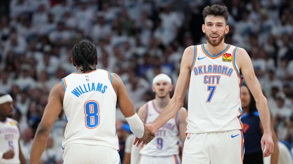 Oklahoma City Thunder forward Chet Holmgren (7) reacts with forward Jalen Williams (8) in the second half during game four of the western conference finals for the 2025 NBA Playoffs at Target Center. 