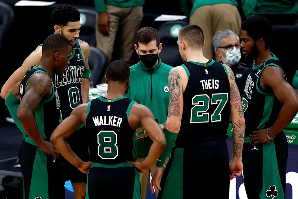 BOSTON, MASSACHUSETTS - FEBRUARY 28: Boston Celtics head coach Brad Stevens talks with Jayson Tatum #0, Javonte Green #43, Kemba Walker #8, Daniel Theis #27, and Semi Ojeleye #37 during the fourth quarter against the Washington Wizards at TD Garden on February 28, 2021 in Boston, Massachusetts. The Celtics defeat the Wizards 111-110. NOTE TO USER: User expressly acknowledges and agrees that, by downloading and or using this photograph, User is consenting to the terms and conditions of the Getty Images License Agreement. (Photo by Maddie Meyer/Getty Images)