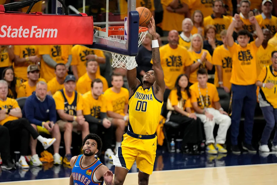 Jun 19, 2025; Indianapolis, Indiana, USA; Indiana Pacers guard Bennedict Mathurin (00) reaches for the ball against the Oklahoma City Thunder during the second half of game six of the 2025 NBA Finals between the Oklahoma City Thunder and the Indiana Pacers at Gainbridge Fieldhouse. Mandatory Credit: Kyle Terada-Imagn Images